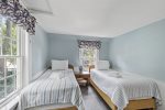 Twin bedroom 1 with two twin beds and central AC Vents